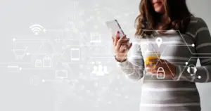 Woman using smartphone with digital marketing icons representing SEO, AI, and algorithm updates
