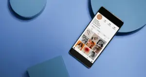 Smartphone displaying Instagram profile for small business social media marketing strategy