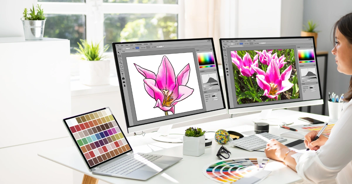 Graphic design editing on dual monitors with digital illustration and color palette | ClickIt Digital Las Vegas & Kansas City
