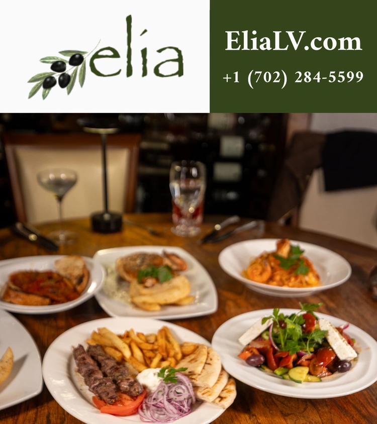 A table with Greek dishes, including grilled meat, fries, pita, salad, pasta, and more. At the top, elia with an olive branch logo, and contact info: EliaLV.com, +1 (702) 284-5599, on a green background.