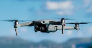 Professional drone capturing aerial footage for drone videography for business, supporting aerial video marketing, brand differentiation, and video content strategy.