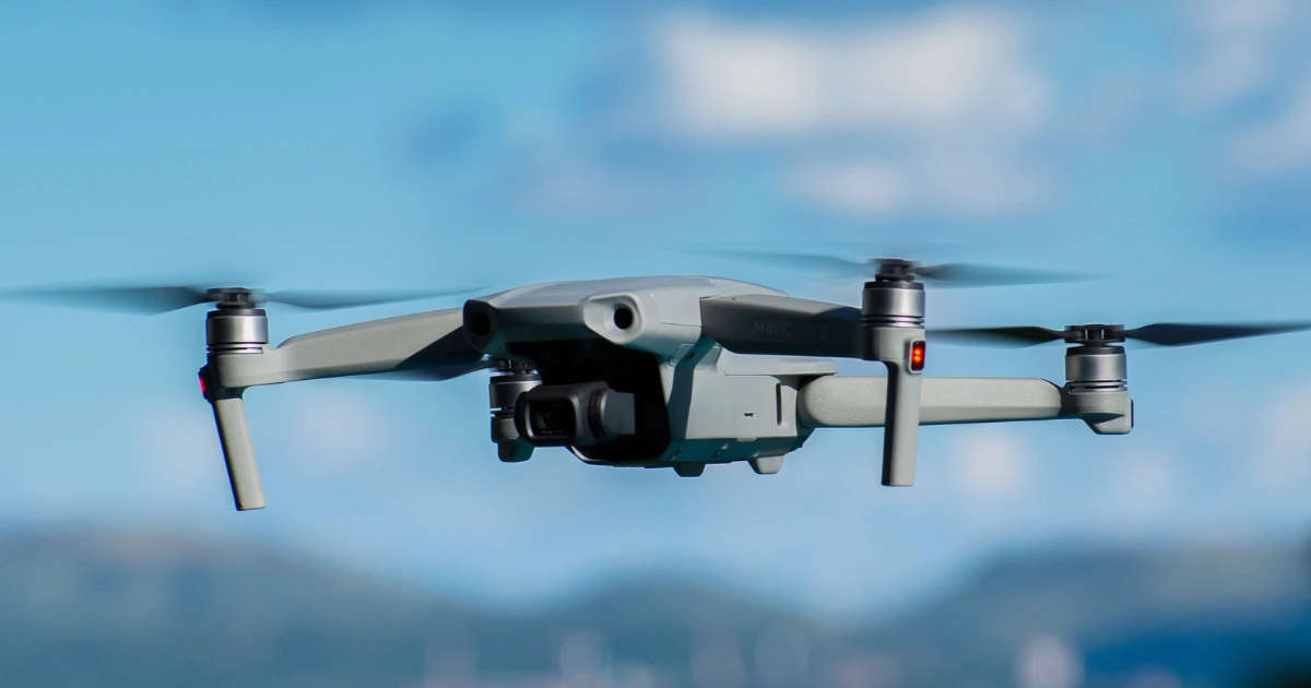 Professional drone capturing aerial footage for drone videography for business, supporting aerial video marketing, brand differentiation, and video content strategy.